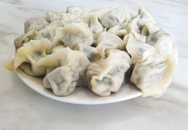 上海开家水饺店投资多少？全维度成本解析与实战策略